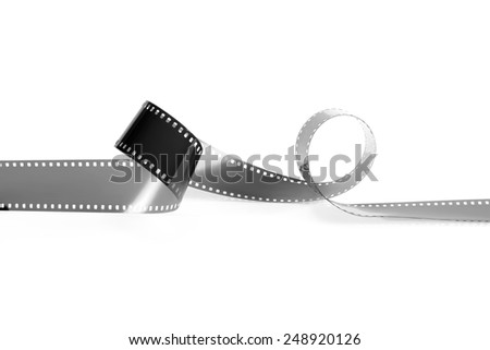 Empty monochrome film from the analog camera on a white background. It is isolated, the worker of paths is present.