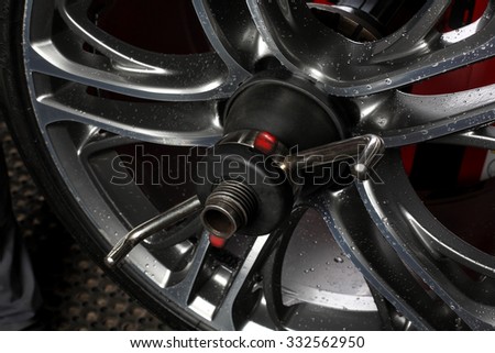 Car service. Tire assembling. Tire balance