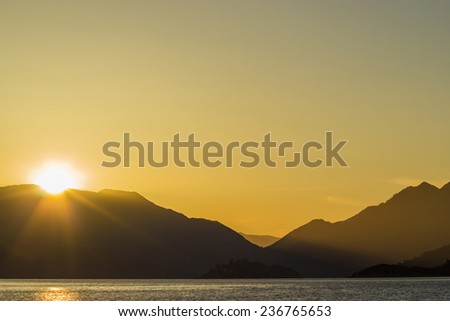 Sunrise over the mountains and the sea