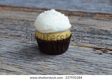 Cupcake on  Dark Wooden Background