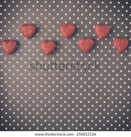 Hearts with red glitter on Polka Dot Background