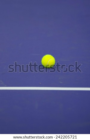 tennis ball on blue court, sport background