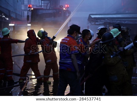 CHIANG MAI, THAILAND JUNE 05: Fire in Fabric shop - catch fire in Fabric shops at Warorot Market Supplies Substantial damage on June 05, 2015 in Chiang Mai, Thailand.