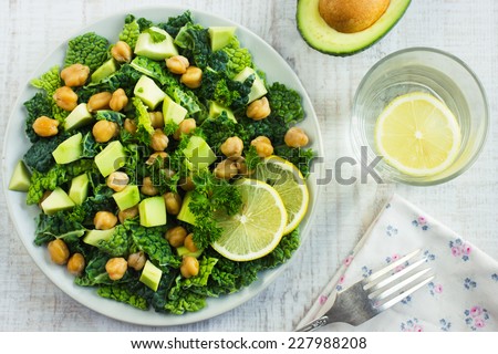 Salad with savoy cabbage, avocado and chickpeas, top view