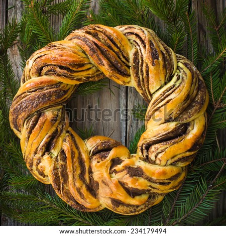 saffron and cinnamon bread wreath, top view, square image