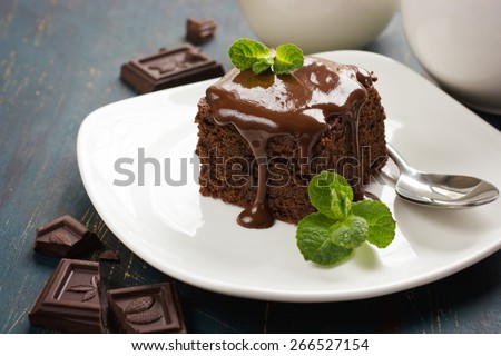 homemade chocolate brownies on dark background