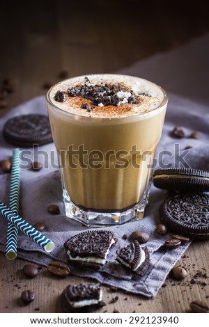 coffee drink with  cookies on wooden background