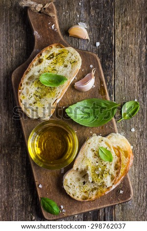 Italian ciabatta  bread with olive oil, top view