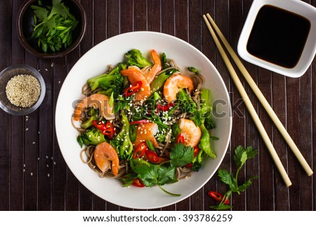 soba noodles with shrimps and vegetables. Asian food. Top view.
