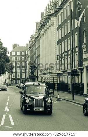 LONDON - 04 OCT 2015: Black taxi in London