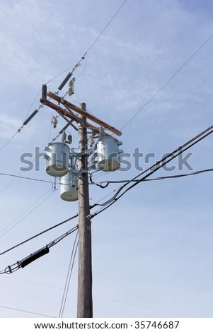 Close up of an electrical power transformer on a power distribution grid
