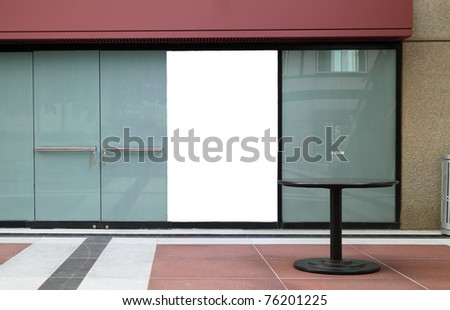 Storefront of an empty store with blank sign to be completed by customer