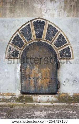 Old metal door wine cellar