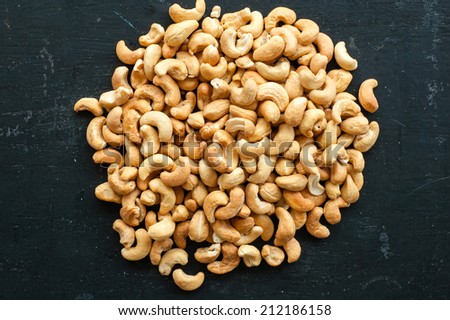 cashew nuts on black background