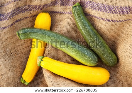 green and yellow zucchini at the farm market.