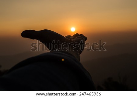 Sunrise with hand