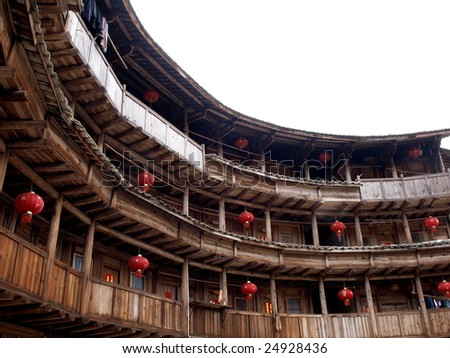 The Earth Tower of Hakka  -an ancient Chinese building in Hujian, China which was in the world heritage by UNESCO. It was taken in spring festival, lots of lanterns decorating  the building