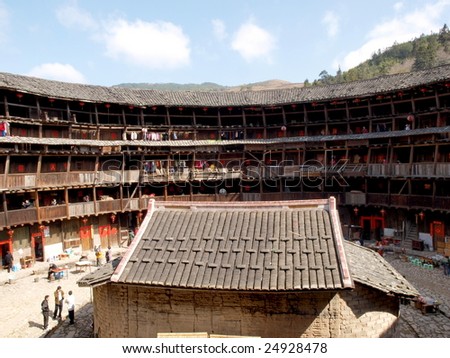 The Earth Tower of Hakka .An ancient Chinese building  which list in the world heritage . It contains hundreds of  apartmenst, each  is for one family. The house iIn  cental is their ancestral hall.
