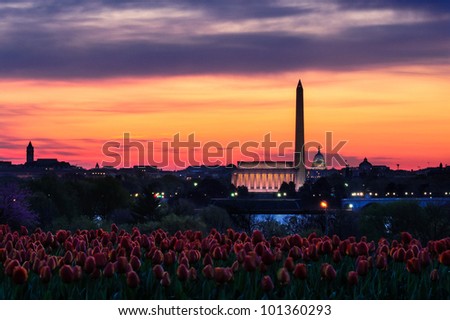 Orange sunset over Washington Monument and Lincoln Memorial viewed from Netherlands Carillon, Washington, D.C, U.S.A.
