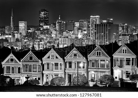 Victorian style houses on the Steiner Street with skylines in the background, Alamo Square Park, Alamo Square, San Francisco, California, USA