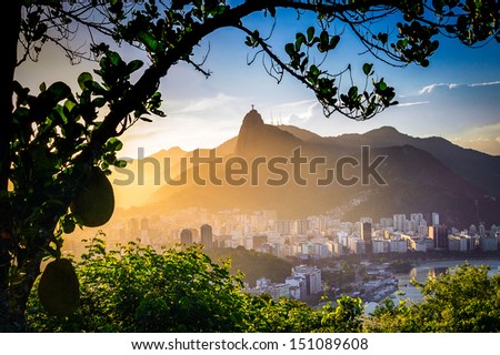Buildings at the waterfront with Christ The Redeemer statue in the background, Corcovado, Rio de Janeiro, Brazil