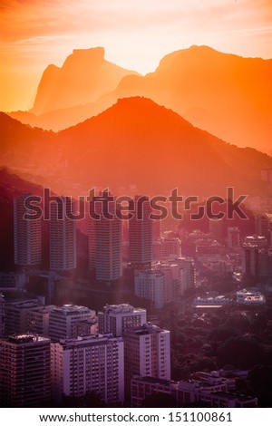 Cityscape with mountain range in the background at dusk, Rio De Janeiro, Brazil
