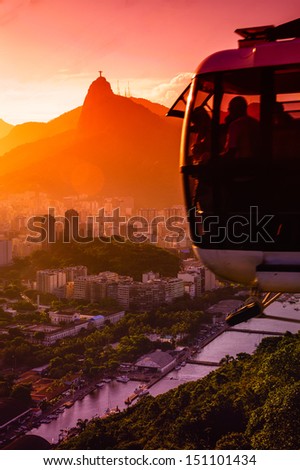 Overhead cable car in motion at dusk, Sugarloaf Mountain, Rio De Janeiro, Brazil