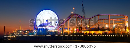 Ferris wheel on Santa Monica Pier lit up at dusk, Santa Monica, Los Angeles County, California, USA