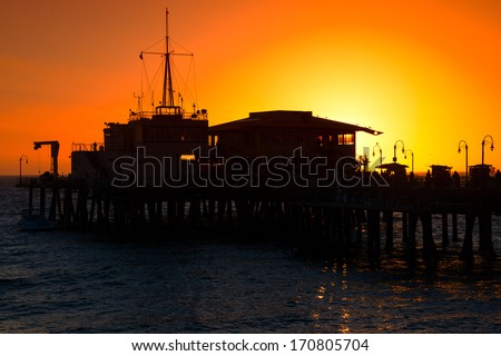 Silhouette of a pier in the ocean, Santa Monica Pier, Santa Monica, Los Angeles County, California, USA