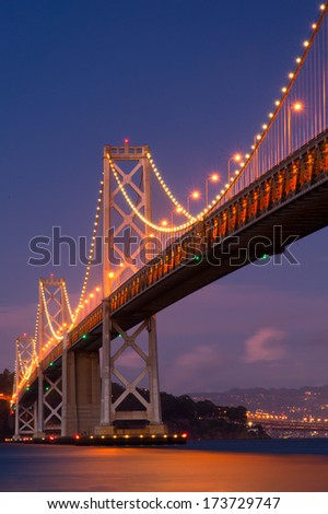 Suspension bridge lit up at night, Bay Bridge, San Francisco Bay, San Francisco, California, USA