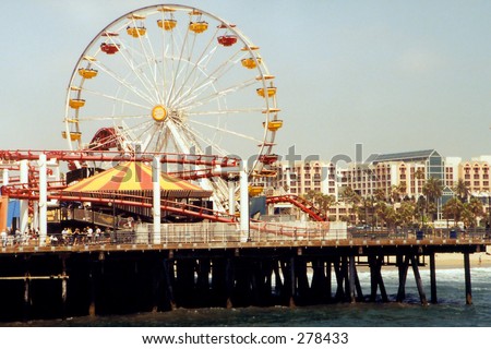 Ferris wheel at an amusement park on top of the Santa Monica Pier in Los Angeles, California