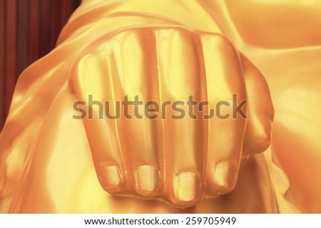 Golden buddha image hand