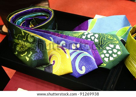 KUALA LUMPUR, MALAYSIA - DEC 10 : Colourful and vivid neck tie using batik texture fashion design on display and for sale during the Kuala Lumpur International Batik (KLIB2011) on December 10, 2011