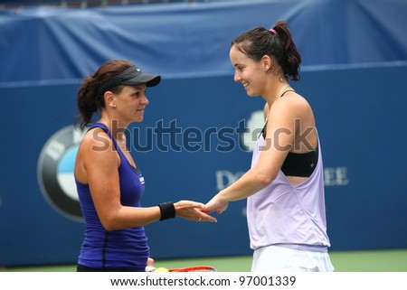 KUALA LUMPUR,MARCH 3-Gajdosova(right) & Dellacqua(left) during a BMW Malaysia Open double semifinals match vs Chang K.C./Chuang C.J. on March 3,2012 in Kuala Lumpur.The Australian double lost(6-4,6-0)