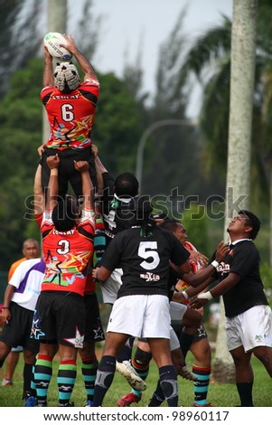 KUALA LUMPUR-MARCH 31: Players jostle for the ball from a line-out during a Malaysian Rugby Union(MRU) Super League match (Keris Conlay vs Bandaraya Dragons) on March 31,2012 in Kuala Lumpur,Malaysia