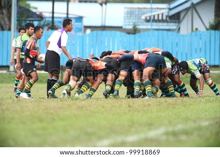 KUALA LUMPUR-APRIL 8: Players form a scrum during a Malaysian Rugby Union(MRU) Super League match between Keris Conlay and ATM RAMD on April 8, 2012 in Kuala Lumpur, Malaysia. Conlay won 29-12