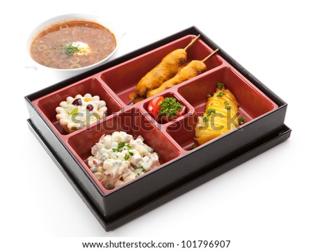 Japanese Meal in a Box (Bento) - Salad, Skewered Meat and Fried Potato and Dessert