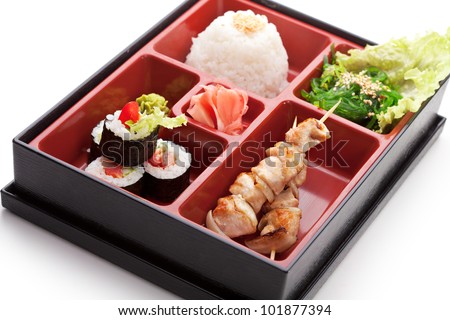 Japanese Meal in a Box (Bento) - Chuka Salad, Skewered Meat with Rice and Sushi Roll