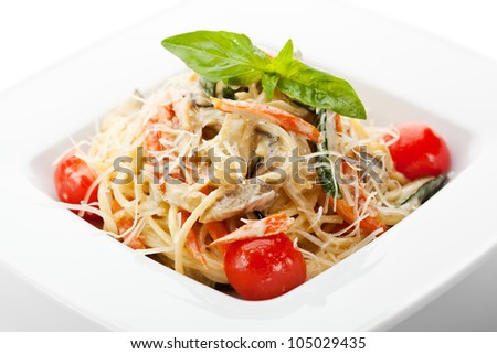 Vegetarian Spaghetti with Vegetables, Basil Leaf and Cherry Tomato
