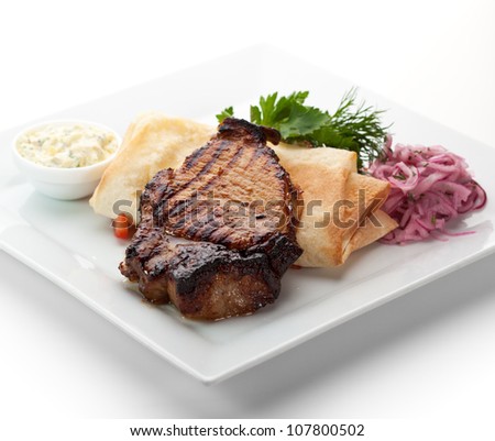 Grilled Foods - BBQ Pork with Vegetables, Pickled Onions, Lavash and Tartar Sauce