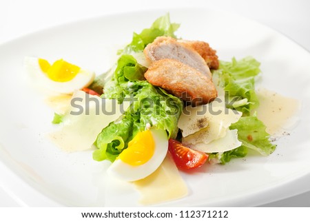 Caesar Salad dressed with Chicken Fillet, Salad Leaf, Croutons, Cherry Tomato, Eggs and Parmesan Cheese