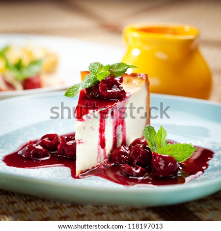 Dessert - Cheesecake with Berries Sauce and Green Mint