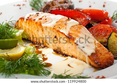 Salmon Steak with Grilled Vegetables, White Sauce and Lime