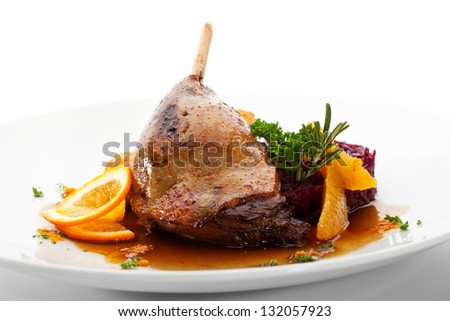 Goose Legs with Cabbage, Croquette and orange Sauce