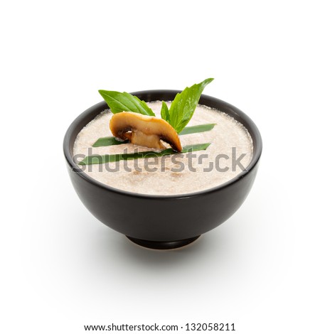 Cream of Mushroom Soup with Lettuce and Basil Leaf