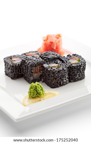 Maki Sushi -  Roll made of Tomato and Shrimp inside. Rice with Cuttlefish Ink outside