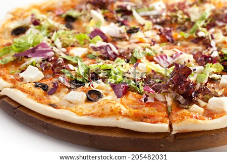 Pizza with Cheese, Olives, Tomatoes and Salad Leaves