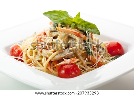 Vegetarian Spaghetti with Vegetables, Basil Leaf and Cherry Tomato