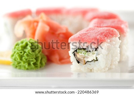 Maki Sushi - Roll with Cucumber and Cream Cheese inside. Topped with Tuna