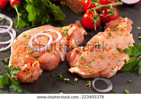 Marinated Pork Loin Steak with Onions and Parsley